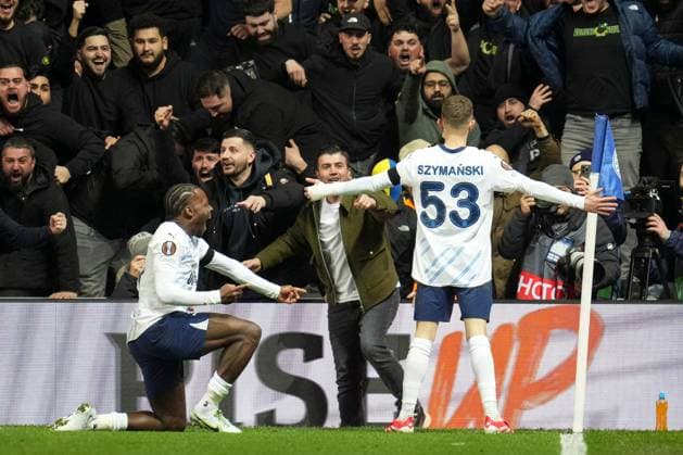 Sebastian Szymanski of Fenerbahce SK celebrates scoring the goal for their side with their teammates to make it 2-0 Rangers v Fenerbahce, UEFA Europa League, Round of 16, Second Leg, Football, Ibrox Stadium, Glasgow, Scotland, UK - 13 Mar 2025 EDITORIAL USE ONLY No use with unauthorised audio, video, data, fixture lists, club league logos or live services. Online in-match use limited to 120 images, no video emulation. No use in betting, games or single club league player publications. Copyright: xStuartxWallace Shutterstockx 15188226ce