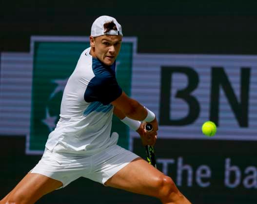 March 13, 2025 Holger Rune (DEN) returns a shot against Tallon Griekspoor (NED) during the 2025 BNP Paribas Open at Indian Wells Tennis Garden in Indian Wells, California. Mandatory Photo Credit: CSM Indian Wells United States of America - ZUMAc04_ 20250313_zma_c04_184 Copyright: xCharlesxBausx