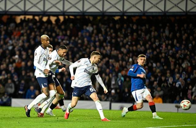 Glasgow, Scotland, 13th March 2025. Sebastian Szymanski of Fenerbahce scores his 2nd goal during the UEFA Europa League match Rangers v Fenerbahce at Ibrox Stadium, Glasgow. Picture credit should read: Neil Hanna Sportimage EDITORIAL USE ONLY. No use with unauthorised audio, video, data, fixture lists, club league logos or live services. Online in-match use limited to 120 images, no video emulation. No use in betting, games or single club league player publications. SPI_014_NH_Rangers_Fenerbahc__e SPI-3743-0014