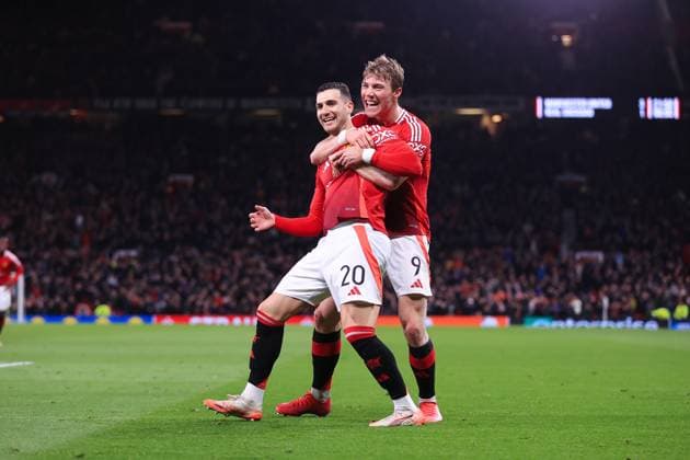 Football - UEFA Champions League - Round of 16 (2nd Leg) - Manchester United, ManU v Real Sociedad 13th March 2025 - UEFA Europa League - Round of 16 (2nd Leg) - Manchester United v Real Sociedad - Diogo Dalot of Manchester United (L) celebrates with Rasmus Hojlund of Manchester United after scoring their 4th goal - Photo: Simon Stacpoole Offside. Manchester UK Copyright: xSimonxStacpoolexOffside