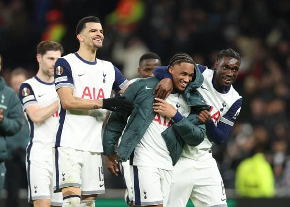 London, England, 13th March 2025. Wilson Odobert of Tottenham is guided towards the fans to take the acclaim during the UEFA Europa League match Tottenham Hotspur v AZ Alkmaar at the Tottenham Hotspur Stadium, London. Picture credit should read: David Klein Sportimage EDITORIAL USE ONLY. No use with unauthorised audio, video, data, fixture lists, club league logos or live services. Online in-match use limited to 120 images, no video emulation. No use in betting, games or single club league player publications. SPI_067_DK_Tottenham_Alkmaar SPI-3742-0067