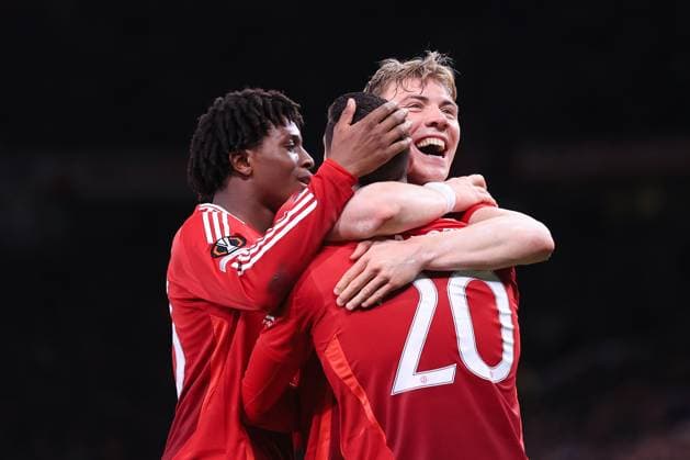 Football - UEFA Champions League - Round of 16 (2nd Leg) - Manchester United, ManU v Real Sociedad 13th March 2025 - UEFA Europa League - Round of 16 (2nd Leg) - Manchester United v Real Sociedad - Diogo Dalot of Manchester United (20) celebrates with Rasmus Hojlund of Manchester United (R) and Patrick Dorgu of Manchester United after scoring their 4th goal - Photo: Simon Stacpoole Offside. Manchester UK Copyright: xSimonxStacpoolexOffside