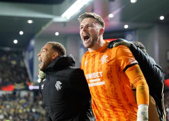 Rangers v Fenerbahce S.K. UEFA Europa League Cyriel Dessers of Rangers (left) and Jack Butland of Rangers celebrate after full time and penalty shoot out during the UEFA Europa League Round of 16 Second Leg match at Ibrox Stadium, Glasgow UK Newspapers OUT Copyright: xFredxPalmerx FIL-21575-0104