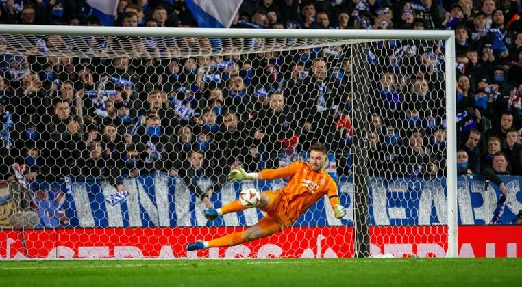 13th March 2025; Ibrox Stadium, Glasgow, Scotland; UEFA Europa League Last 16 Second Leg Football, Rangers versus Fenerbahce; Jack Butland of Rangers saves during the penalty shootout  ActionPlus12760111 VagelisxGeorgariou