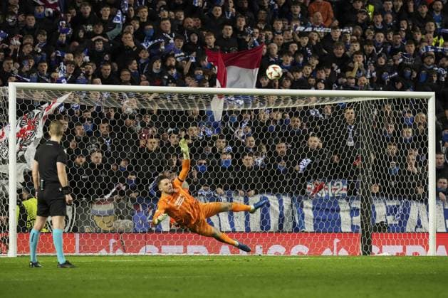 Rangers win the penalty shootout as Mert Hakan Yandas of Fenerbahce SK fails to score their penalty Rangers v Fenerbahce, UEFA Europa League, Round of 16, Second Leg, Football, Ibrox Stadium, Glasgow, Scotland, UK - 13 Mar 2025 EDITORIAL USE ONLY No use with unauthorised audio, video, data, fixture lists, club league logos or live services. Online in-match use limited to 120 images, no video emulation. No use in betting, games or single club league player publications.  Copyright: xStuartxWallace Shutterstockx 15188226ek