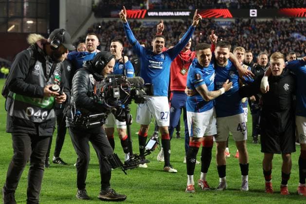 Leon Balogun of Rangers and his team mates celebrate after winning the penalty shoot out during the Europa League last 16 match at Ibrox Stadium, Glasgow. Rangers v Fenerbahce, UEFA Europa League, Round of 16, Second Leg, Football, Ibrox Stadium, Glasgow, Scotland, UK - 13 Mar 2025 EDITORIAL USE ONLY No use with unauthorised audio, video, data, fixture lists, club league logos or live services. Online in-match use limited to 120 images, no video emulation. No use in betting, games or single club league player publications.  Copyright: xO Rourke RangersxFC Shutterstockx 15196580cp