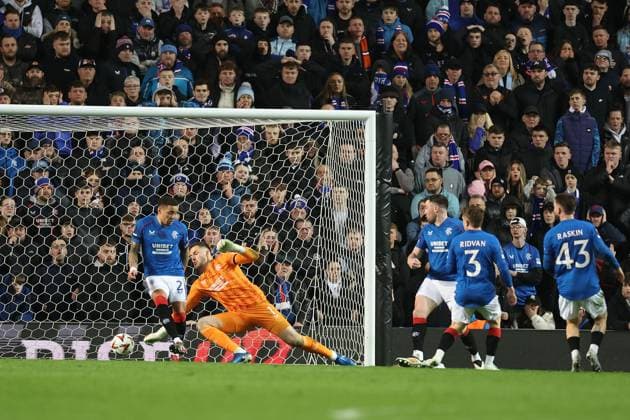 Rangers goalkeeper Jack Butland and James Tavernier can t stop Sebastian Szymanski of Fenerbahce scoring his second goal during the Europa League last 16 match at Ibrox Stadium, Glasgow. Rangers v Fenerbahce, UEFA Europa League, Round of 16, Second Leg, Football, Ibrox Stadium, Glasgow, Scotland, UK - 13 Mar 2025 EDITORIAL USE ONLY No use with unauthorised audio, video, data, fixture lists, club league logos or live services. Online in-match use limited to 120 images, no video emulation. No use in betting, games or single club league player publications.  Copyright: xO Rourke RangersxFC Shutterstockx 15196580da