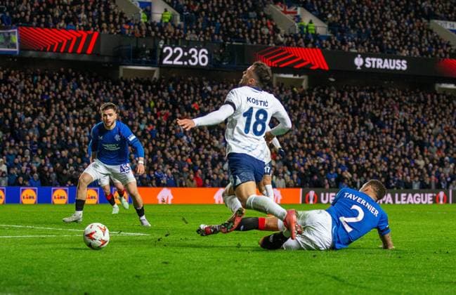 13th March 2025; Ibrox Stadium, Glasgow, Scotland; UEFA Europa League Last 16 Second Leg Football, Rangers versus Fenerbahce; Filip Kostic of Fenerbahce goes down in the box after a challenge from James Tavernier of Rangers  ActionPlus12760320 VagelisxGeorgariou
