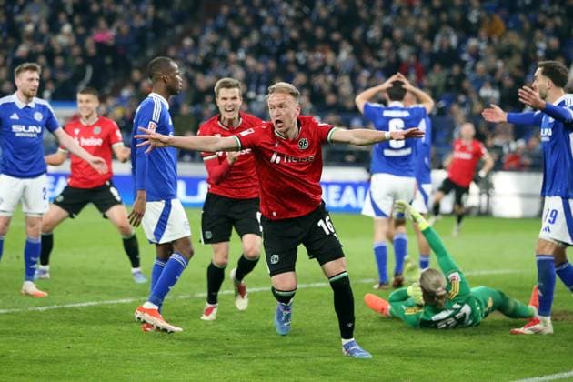 14.03.2025, xrekx, Fussball 2.Bundesliga, FC Schalke 04 - Hannover 96 v.l. Torjubel nach dem Tor zum 1:2 celebrating the goal celebrate durch Havard Nielsen (Hannover 96) (DFL DFB REGULATIONS PROHIBIT ANY USE OF PHOTOGRAPHS as IMAGE SEQUENCES and or QUASI-VIDEO) Gelsenkirchen