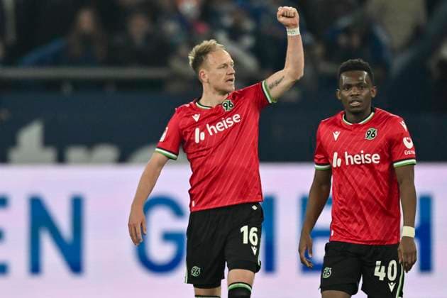 RECORD DATE NOT STATED Havard Nielsen (Hannover 16) jubelt nach dem Tor zum 1:2 mit Rabbi Matondo (Hannover 40) 14.03.2025 Fussball FC Schalke 04 vs Hannover 96, Veltins-Arena, Gelsenkirchen, DFB DFL REGULATIONS PROHIBIT ANY USE OF PHOTOGRAPHS AS IMAGE SEQUENCES AND OR QUASI-VIDEO