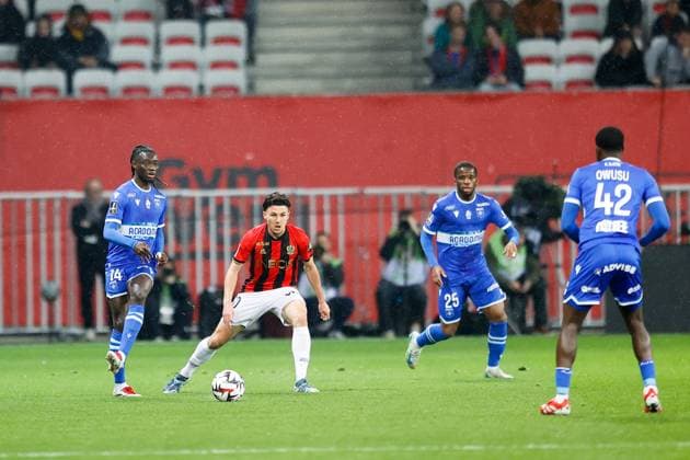 OGC Nice v AJ Auxerre - Ligue 1 McDonald s 2024 2025 14 Gideon MENSAH (aja) - 20 Tom LOUCHET (ogcn) during the Ligue 1 MacDonald s match between Nice and Auxerre at Allianz Riviera on March 14, 2025 in Nice, France. Nice France  Copyright: xFEPx 776296010