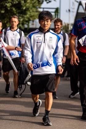 March 15, 2025, Melbourne, Victoria, Australia: Visa Cash App Racing Bulls Formula One Team driver YUKI TSUNODA of Japan enters the paddock on Saturday at the Formula 1 Louis Vuitton Australian Grand Prix 2025 on March 15, 2025 in Melbourne, Australia. Melbourne Australia - ZUMAf186 20250315_zsp_f186_023 Copyright: xJamesxForresterx