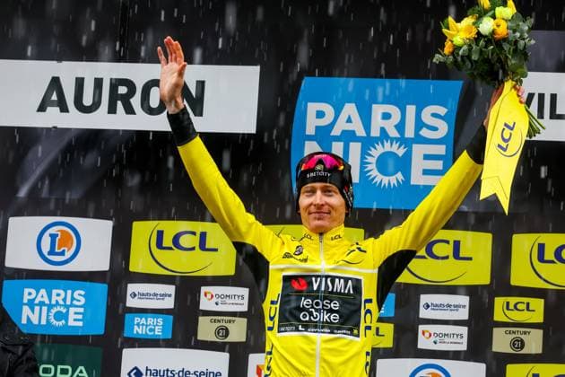 American Matteo Jorgenson of Team Visma-Lease a Bike celebrates on the podium in the yellow jersey of leader in the overall ranking after stage seven of the 83th edition of the Paris-Nice cycling race, 147,8 km from Nice to Auron, France, Saturday 15 March 2025. DAVIDxPINTENS  x115007143x