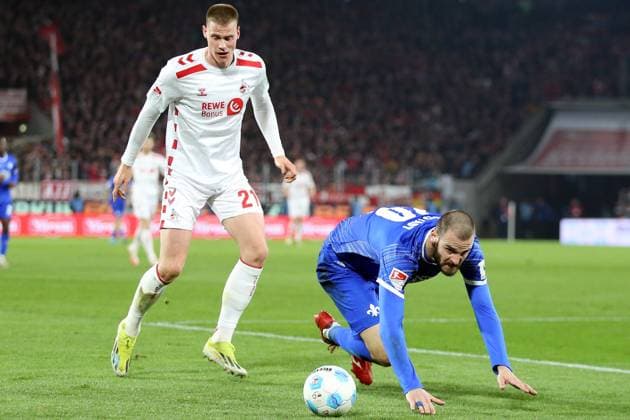15.03.2025, xrekx, Fussball 2.Bundesliga, 1.FC Koeln - SV Darmstadt 98 v.l. Steffen Tigges (1.FC Koeln) Aleksandar Vukotic (SV Darmstadt 98) Zweikampf, Aktion, action, battle for the ball (DFL DFB REGULATIONS PROHIBIT ANY USE OF PHOTOGRAPHS as IMAGE SEQUENCES and or QUASI-VIDEO) Koeln