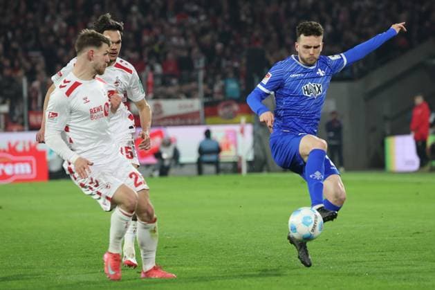 Jan Thielmann (Koeln 29) und Sergio Lopez (Darmstadt 2), GER, 1. FC Koeln vs. SV Darmstadt 98, 2. Fussball-Bundesliga, 26. Spieltag, Saison 2024 2025, 15.03.2025, DFL REGULATIONS PROHIBIT ANY USE OF PHOTOGRAPHS AS IMAGE SEQUENCES AND OR QUASI-VIDEO, GER, 1. FC Koeln vs. SV Darmstadt 98, 2. Fussball-Bundesliga, 26. Spieltag, Saison 2024 2025, 15.03.2025, Koeln