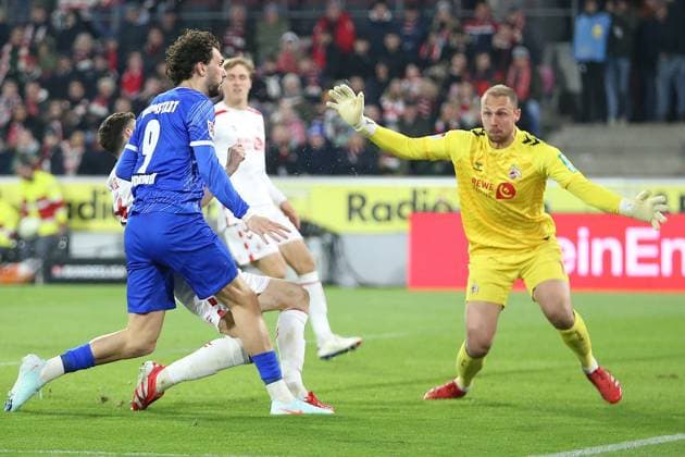 15.03.2025, xrekx, Fussball 2.Bundesliga, 1.FC Koeln - SV Darmstadt 98 v.l. Fraser Hornby (SV Darmstadt 98) Marvin Schwäbe Schwaebe (1.FC Koeln) (DFL DFB REGULATIONS PROHIBIT ANY USE OF PHOTOGRAPHS as IMAGE SEQUENCES and or QUASI-VIDEO) Koeln