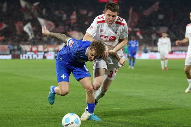 15.03.2025, xrekx, Fussball 2.Bundesliga, 1.FC Koeln - SV Darmstadt 98 v.l. Luca Marseiler (SV Darmstadt 98) Dominique Heintz (1.FC Koeln) Zweikampf, Aktion, action, battle for the ball (DFL DFB REGULATIONS PROHIBIT ANY USE OF PHOTOGRAPHS as IMAGE SEQUENCES and or QUASI-VIDEO) Koeln