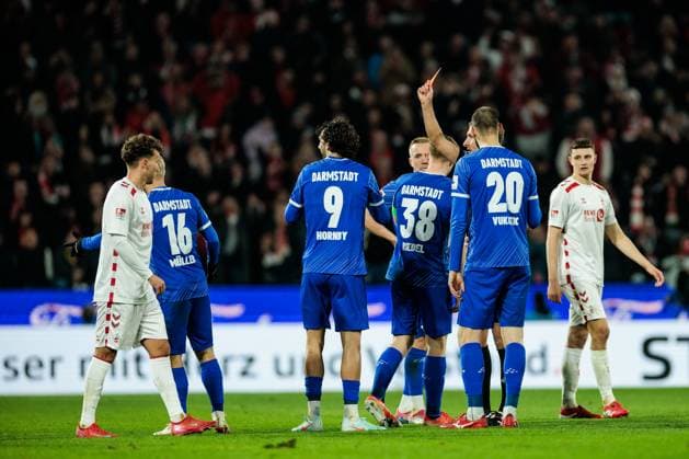 RECORD DATE NOT STATED 2. Fußball Bundesliga: 1. FC Köln - SV Darmstadt 98; 15.03.2025 Fraser Hornby (SV Darmstadt 98, 9) sieht Gelb-Rot 2. Fußball Bundesliga, 1. FC Köln - SV Darmstadt 98, Köln, Rheinenergiestadion am 15.03.2025 DFL REGULATIONS PROHIBIT ANY USE OF PHOTOGRAPHS AS IMAGE SEQUENCES AND OR QUASI-VIDEO.