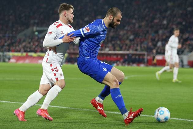 15.03.2025, xrekx, Fussball 2.Bundesliga, 1.FC Koeln - SV Darmstadt 98 v.l. Jan Thielmann (1.FC Koeln) Aleksandar Vukotic (SV Darmstadt 98) Zweikampf, Aktion, action, battle for the ball (DFL DFB REGULATIONS PROHIBIT ANY USE OF PHOTOGRAPHS as IMAGE SEQUENCES and or QUASI-VIDEO) Koeln