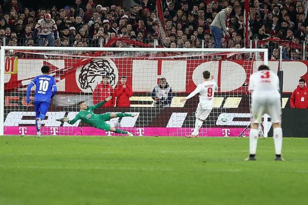 15.03.2025, xrekx, Fussball 2.Bundesliga, 1.FC Koeln - SV Darmstadt 98 v.l. Torschuss zum 2:1 Elfmeter durch Luca Waldschmidt (1.FC Koeln) Marcel Schuhen (SV Darmstadt 98) (DFL DFB REGULATIONS PROHIBIT ANY USE OF PHOTOGRAPHS as IMAGE SEQUENCES and or QUASI-VIDEO) Koeln