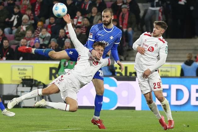 15.03.2025, xrekx, Fussball 2.Bundesliga, 1.FC Koeln - SV Darmstadt 98 v.l. Timo Hübers Huebers (1.FC Koeln) Aleksandar Vukotic (SV Darmstadt 98) Zweikampf, Aktion, action, battle for the ball Jan Thielmann (1.FC Koeln) (DFL DFB REGULATIONS PROHIBIT ANY USE OF PHOTOGRAPHS as IMAGE SEQUENCES and or QUASI-VIDEO) Koeln