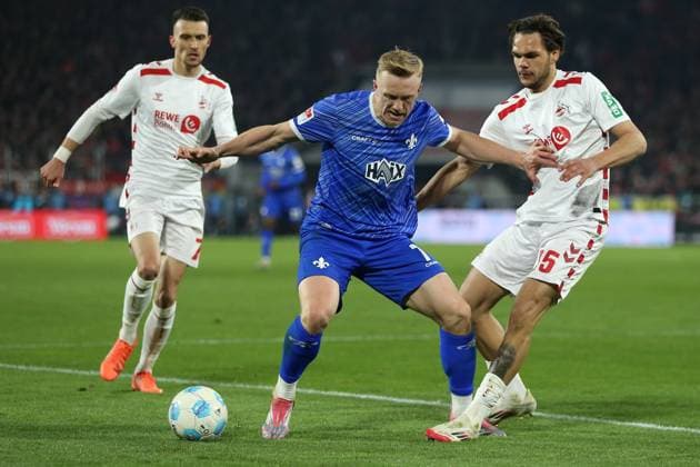 15.03.2025, xrekx, Fussball 2.Bundesliga, 1.FC Koeln - SV Darmstadt 98 v.l. Isac Lidberg (SV Darmstadt 98) Max Finkgräfe Finkgraefe (1.FC Koeln) Zweikampf, Aktion, action, battle for the ball (DFL DFB REGULATIONS PROHIBIT ANY USE OF PHOTOGRAPHS as IMAGE SEQUENCES and or QUASI-VIDEO) Koeln