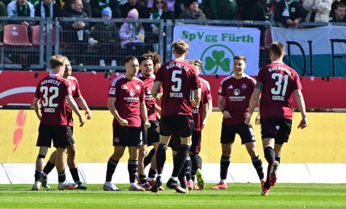 16.03.2025 - Fussball - Saison 2024 2025 - 2. Fussball - Bundesliga - 26. Spieltag: 1. FC Nürnberg FCN ( Club ) - SpVgg Greuther Fürth ( Kleeblatt ) Derby Frankenderby - Sportfoto Zink MeZi - xmexzix - DFL regulations prohibit any use of photographs as image sequences and or quasi-video - only for editorial use - Torjubel Jubel Freude nach Treffer Tor Torschuß zum 1:0 durch Julian Justvan (10, 1. FC Nürnberg FCN )