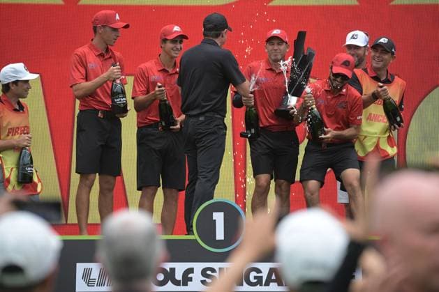 (250316) -- SINGAPORE, March 16, 2025 -- Spain s Sergio Garcia (4th R) of Fireballs GC celebrates with his teammates after winning the team title during the final round of LIV Golf Singapore held at Sentosa Golf Club in Singapore on March 16, 2025. (Photo by Then Chih Wey Xinhua) (SP)SINGAPORE-GOLF-LIV GOLF-FINAL XinxJiapo 