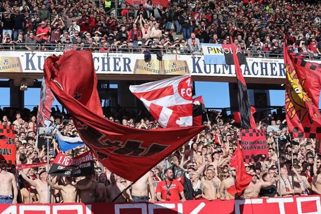 16.03.2025 - Fussball - Saison 2024 2025 - 2. Fussball - Bundesliga - 26. Spieltag: 1. FC Nürnberg FCN ( Club ) - SpVgg Greuther Fürth ( Kleeblatt ) Derby Frankenderby - Sportfoto Zink DaMa - xdaxmax - DFL regulations prohibit any use of photographs as image sequences and or quasi-video - only for editorial use - Symbolbild Symbolfoto Feature Impression - Clubfan Clubfans FCN-Fans Fans feuern Mannschaft Team des FCN an