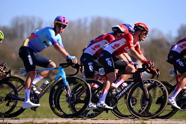 Danilith Nokere Koerse 2025 cycling race NOKERE, BELGIUM - MARCH 19 : Grisel Matys (FRA) of Lotto, Stokbro Andreas (DEN) of Unibet Tietema Rockets during the Men Elite UCI 1.Pro 78th Danilith Nokere Koerse cycling race with start in Deinze and finish in Nokere (188,2 km) on March 19, 2025 in Nokere, Belgium, 19 03 2025 ( Motordriver Rodrique Verfaillie & Nokere Belgium  Copyright: xTomasxSiskx