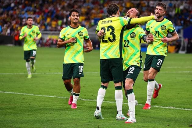 20th March 2025; The Sydney Football Stadium, Sydney, NSW, AFC World Cup Qualifiers, 3rd Round, Group C Football, Australia versus Indonesia; Jackson Irvine of Australia celebrates with Craig Goodwin of Australia after scoring a goal in the 90th minute for 5-1  ActionPlus12763347 KevinxManning