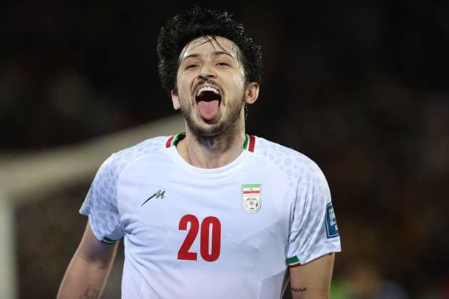 TEHRAN, IRAN - 20 March 2025 - Sardar Azmoun of Iran celebrates after scoring opening goal during the FIFA World Cup, WM, Weltmeisterschaft, Fussball 2026 Qualification AFC, Group A round 7 match between Iran and UAE, United Arabic Emirates national football team at Azadi Stadium in Tehran, Iran Iran v UAE - FIFA World Cup 2026 Qualification AFC, Group A, round 7 match. Copyright: xSoccerxImagesx
