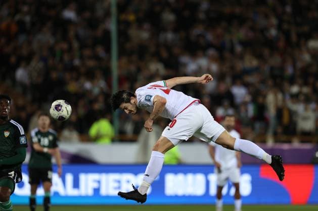 TEHRAN, IRAN - 20 March 2025 - Sardar Azmoun of Iran scoring a goal during the FIFA World Cup, WM, Weltmeisterschaft, Fussball 2026 Qualification AFC, Group A round 7 match between Iran and UAE, United Arabic Emirates national football team at Azadi Stadium in Tehran, Iran Iran v UAE - FIFA World Cup 2026 Qualification AFC, Group A, round 7 match. Copyright: xSoccerxImagesx