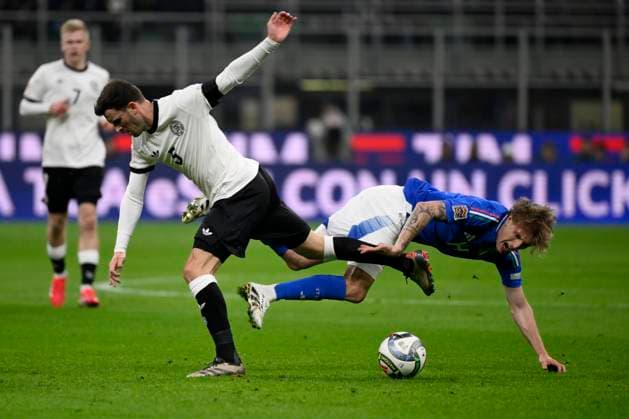 Pascal Gross of Germany and Nicolo Rovella of Italy during the UEFA Nations League football match between Italy and Germany at San Siro stadium in Milano (Italy), March 20, 2025. AndreaxStaccioli