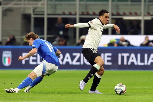 Uefa Nations League 2025: Quarter finals Italy vs Germany at Giuseppe Meazza Stadium in Milan Milan, Italy 20.03.2025: Nicolo Rovella of Italy, Jamal Musiala of Germany seen in action during the Uefa Nations League 2025, quarter finals, football match between Italy vs Germany at Giuseppe Meazza stadium in Milan. milan Giuseppe Meazza italy Italy Copyright: xmarcoxiacobucci
