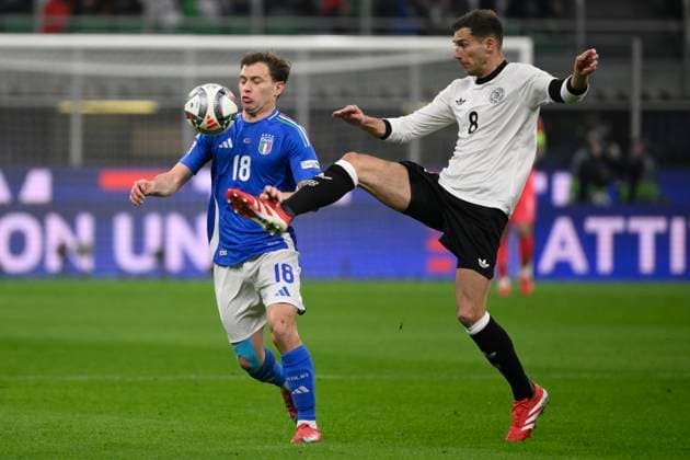 Nicolo Barella of Italy and Leon Goretzka of Germany during the UEFA Nations League football match between Italy and Germany at San Siro stadium in Milano (Italy), March 20, 2025. AndreaxStaccioli