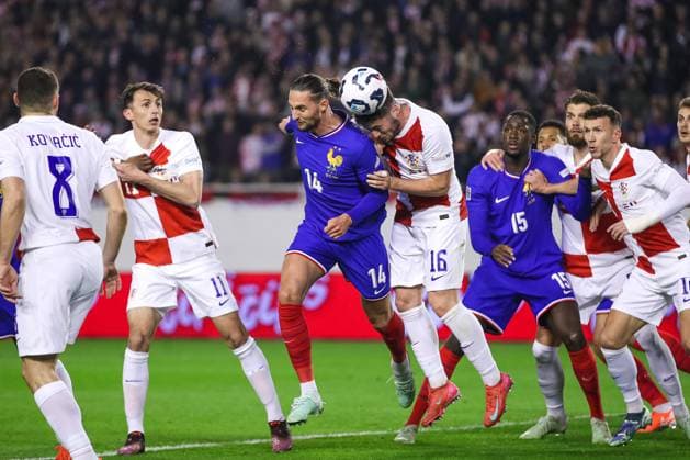 Croatia v France - UEFA Nations League Quarterfinal Leg One SPLIT, CROATIA - MARCH 20: Adrien Rabiot of France and Martin Baturina of Croatia fight for a ball during the UEFA Nations League quarterfinal leg one match between Croatia and France at Stadion Poljud on March 20, 2025 in Split, Croatia.  IgorxKralj PIXSELL
