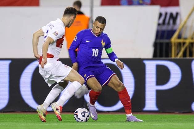 Croatia v France - UEFA Nations League Quarterfinal Leg One SPLIT, CROATIA - MARCH 20: Kylian Mbappe of France is challenged by Josip Stanisic of Croatia during the UEFA Nations League quarterfinal leg one match between Croatia and France at Stadion Poljud on March 20, 2025 in Split, Croatia.  IgorxKralj PIXSELL