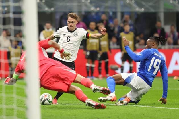 Uefa Nations League 2025: Quarter finals Italy vs Germany at Giuseppe Meazza Stadium in Milan Milan, Italy 20.03.2025: Gianluigi Donnarumma of Italy, Joshua Kimmich of Germany, Destiny Udogie of Italy seen in action during the Uefa Nations League 2025, quarter finals, football match between Italy vs Germany at Giuseppe Meazza stadium in Milan. milan Giuseppe Meazza italy Italy Copyright: xmarcoxiacobucci
