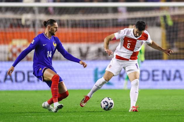 Croatia v France - UEFA Nations League Quarterfinal Leg One SPLIT, CROATIA - MARCH 20: Josip Sutalo of Croatia is challenged by Adrien Rabiot of France during the UEFA Nations League quarterfinal leg one match between Croatia and France at Stadion Poljud on March 20, 2025 in Split, Croatia.  IgorxKralj PIXSELL