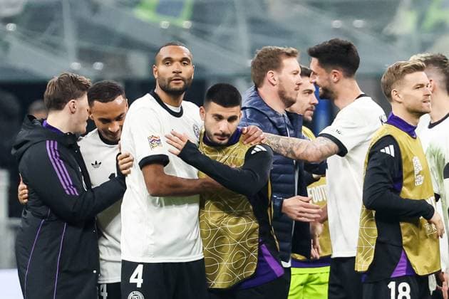Endstand 1:2 fuer Deutschland. Das DFB Team besiegt Italien. Jonathan Tah (Deutschland, 04) und Denis Undav (Deutschland, 13) umarmen sich. Julian Nagelsmann (Deutschland, Bundestrainer) gratuliert Tim Kleindienst (Deutschland, 09). ITA, Italien (ITA) vs. Deutschland (GER), Fussball Laenderspiel, UEFA Nations League Viertelfinale Runde1, 2024 2025, 20.03.2025 ITA, Italien (ITA) vs. Deutschland (GER), Fussball Laenderspiel, UEFA Nations League Viertelfinale Runde1, 2024 2025, 20.03.2025 Mailand Copyright: xEibner-Pressefoto RogerxBuerkex EP_RBE