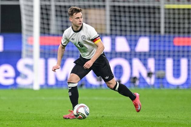 Joshua Kimmich (Germany) controls the Ball during the UEFA Nations League quarterfinal leg one match between Italy and Germany at Stadio San Siro on March 20, 2025 in Milan, Italy. (Photo by Harry Langer DeFodi Images)