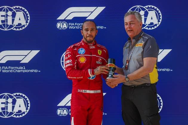 SHANGHAI, CHINA- MARCH 21: Lewis Hamilton of Great Britain and Scuderia Ferrari and Mario Isola of Pirelli look on in the parc ferme during Sprint Qualifying ahead of the F1 Grand Prix of CHINA at Shanghai International Circuit on March 21, 2025 in Shanghai, China.(Photo by Zhu Xingjian Paddocker) F1 Grand Prix of China: Practice