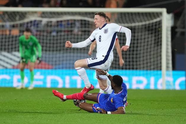 Elliot Anderson of England takes on Christian Matsima of France France U21, U 21 v England U21, International Friendly, Länderspiel, Nationalmannschaft Football, Stade du Moustoir, Lorient, France - 21 Mar 2025 EDITORIAL USE ONLY No use with unauthorised audio, video, data, fixture lists, club league logos or live services. Online in-match use limited to 120 images, no video emulation. No use in betting, games or single club league player publications. Copyright: xDavexWinter Shutterstockx 15215626ac