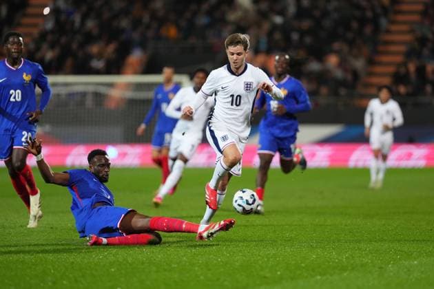 James McAtee of England takes on Christian Matsima of France France U21, U 21 v England U21, International Friendly, Länderspiel, Nationalmannschaft Football, Stade du Moustoir, Lorient, France - 21 Mar 2025 EDITORIAL USE ONLY No use with unauthorised audio, video, data, fixture lists, club league logos or live services. Online in-match use limited to 120 images, no video emulation. No use in betting, games or single club league player publications. Copyright: xDavexWinter Shutterstockx 15215626ai