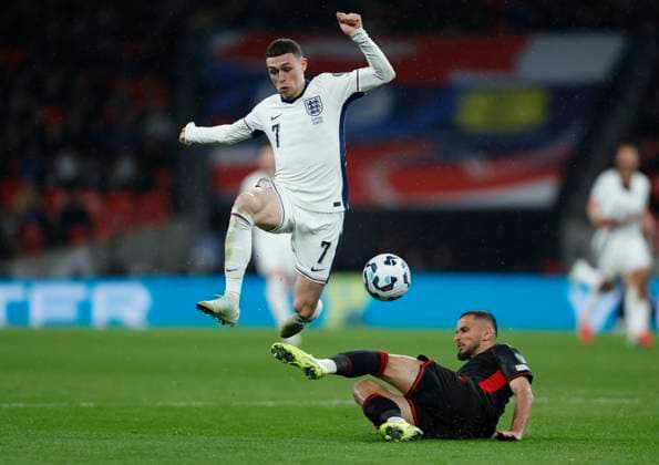 England v Albania - European Qualifiers Group K - FIFA World Cup, WM, Weltmeisterschaft, Fussball 2026 Phil Foden of England and Naser Aliji of Albania challenge during the FIFA World Cup 2026 European Qualifier between England and Albania at Wembley Stadium on March 21, 2025 in London, England. London Wembley Stadium England United Kingdom Copyright: xNigelxFrench Sportsphoto APLx 14062499