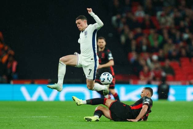 England v Albania Naser Aliji of Albania slide tackling Phil Foden of England during the England v Albania World Cup Group K qualifier at Wembley Stadium, London, England, United Kingdom on 21 March 2025 Credit: Dylan Hepworth Every Second Media Editorial use only. All images are copyright Every Second Media Limited. No images may be reproduced without prior permission. Copyright: xIMAGO EveryxSecondxMediax ESM-1390-0037 DylanxHepworthx xEveryxSecondxMediax