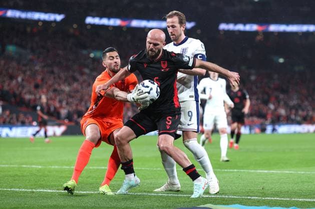England v Albania 21 March 2025, London - UEFA EUROs Qualifiers - England v Albania - Harry Kane of England pushes Arlin Ajeti of Albania into the ball and off the pitch for a corner before goalkeeper Thomas Strakosha can get his hand to it - Photo: Charlotte Wilson Offside. London UK Copyright: xCharlottexWilsonx xOffsidexOffside