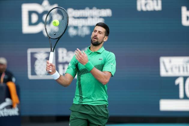 March 21, 2025, Miami Gardens, Florida, United States Of America: MIAMI GARDENS, FLORIDA - MARCH 21: Novak Djokovic of Serbia defeats Rinky Hijikata of Australia during Day 4 of the Miami Open at Hard Rock Stadium on March 21, 2025 in Miami Gardens, Florida. ...People: Novak Djokovic Miami Open 2025 - Day 4  - ZUMAs214 20250321_ada_s214_033 Copyright: xSMGx