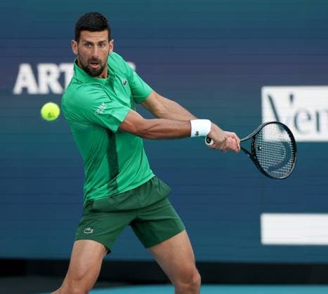 March 21, 2025, Miami Gardens, Florida, United States Of America: MIAMI GARDENS, FLORIDA - MARCH 21: Novak Djokovic of Serbia defeats Rinky Hijikata of Australia during Day 4 of the Miami Open at Hard Rock Stadium on March 21, 2025 in Miami Gardens, Florida. ...People: Novak Djokovic Miami Gardens United States Of America - ZUMAs214 20250321_ada_s214_026 Copyright: xSMGx